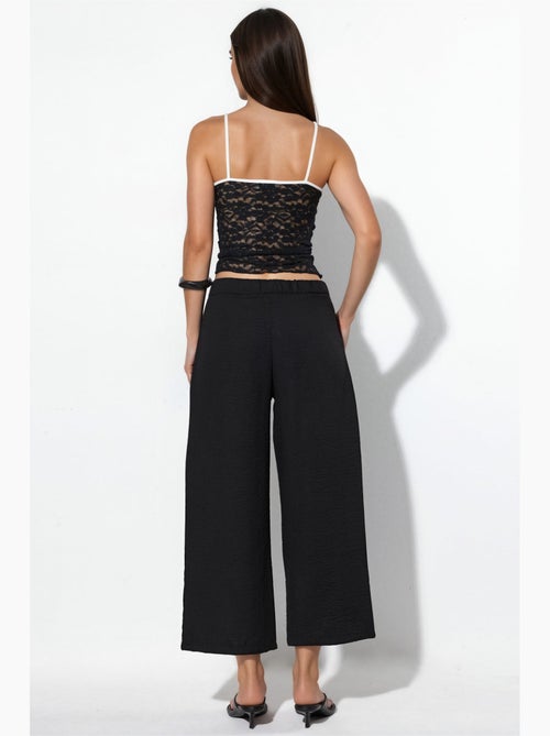 Pantalon femme taille haute à jambe large busem - Kiabi Pantalon femme taille haute à jambe large busem - Kiabi