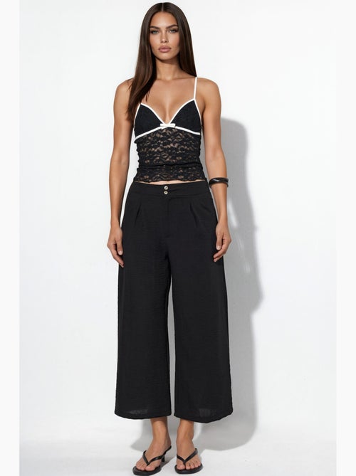 Pantalon femme taille haute à jambe large busem - Kiabi Pantalon femme taille haute à jambe large busem - Kiabi