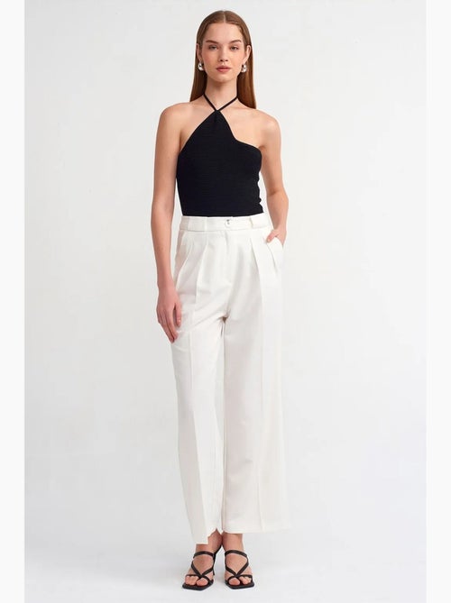 Pantalon femme taille haute à jambe large en crêpe dilvin - Kiabi Pantalon femme taille haute à jambe large en crêpe dilvin - Kiabi