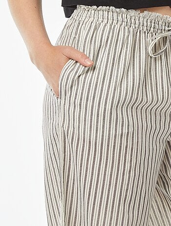 Pantalon fin rayé à franges