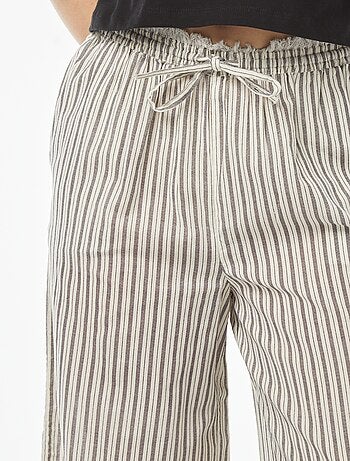 Pantalon fin rayé à franges