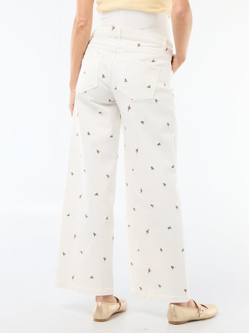 Pantalon grossesse avec ceinture stretch et motif brodé - Kiabi