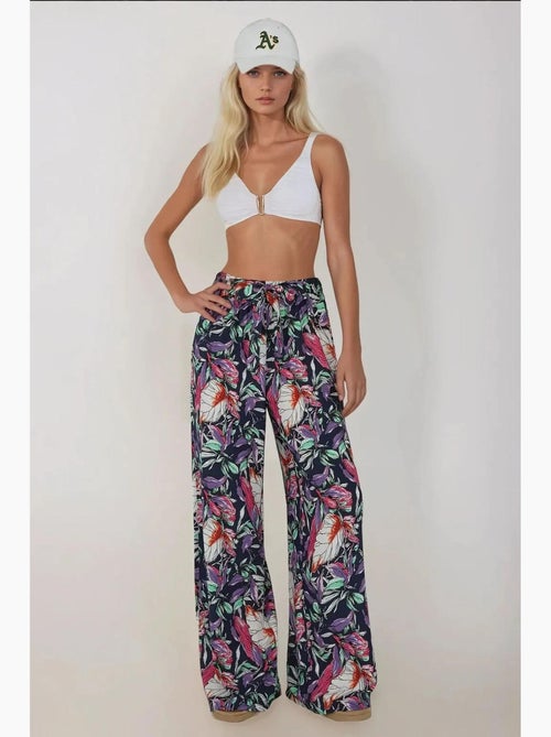 Pantalon imprimé à taille élastique et jambes larges hiccup - Kiabi Pantalon imprimé à taille élastique et jambes larges hiccup - Kiabi