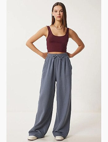 Pantalon jambes larges, taille élastique, cordon de serrage, finitions bordées istanbul