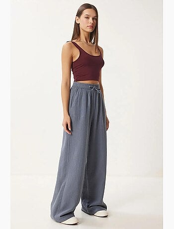 Pantalon jambes larges, taille élastique, cordon de serrage, finitions bordées istanbul