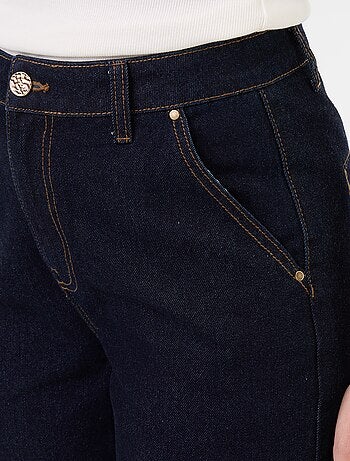 Pantalon jean uni avec larges revers à la base
