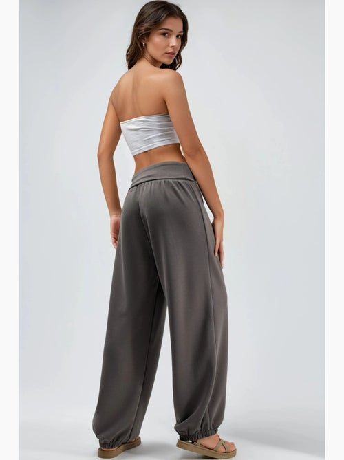 Pantalon jogger en maille à taille mi-haute et jambe large busem - Kiabi Pantalon jogger en maille à taille mi-haute et jambe large busem - Kiabi
