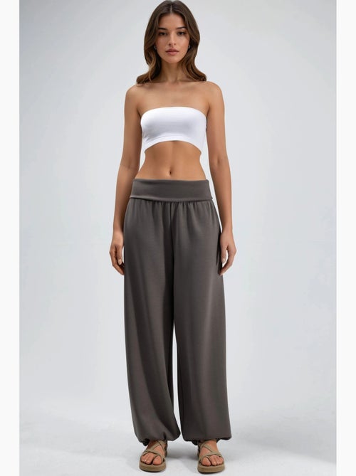 Pantalon jogger en maille à taille mi-haute et jambe large busem - Kiabi Pantalon jogger en maille à taille mi-haute et jambe large busem - Kiabi