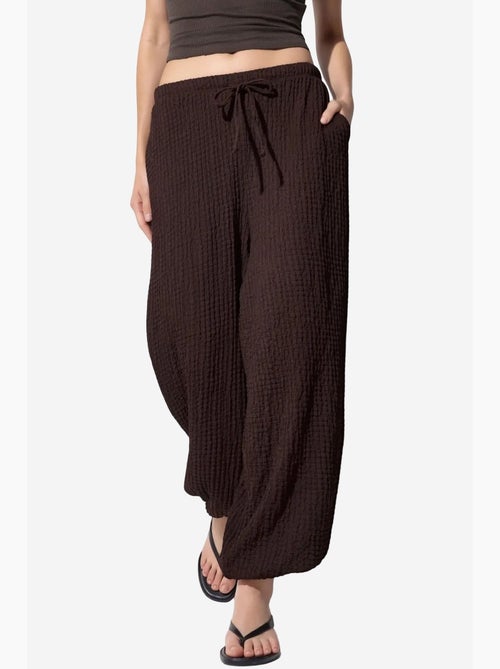 Pantalon jogger femme en tissu tissé busem - Kiabi Pantalon jogger femme en tissu tissé busem - Kiabi