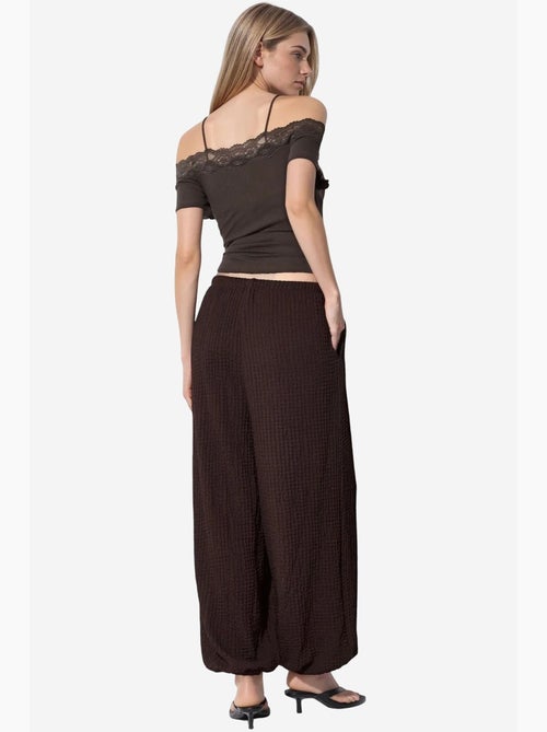 Pantalon jogger femme en tissu tissé busem - Kiabi Pantalon jogger femme en tissu tissé busem - Kiabi