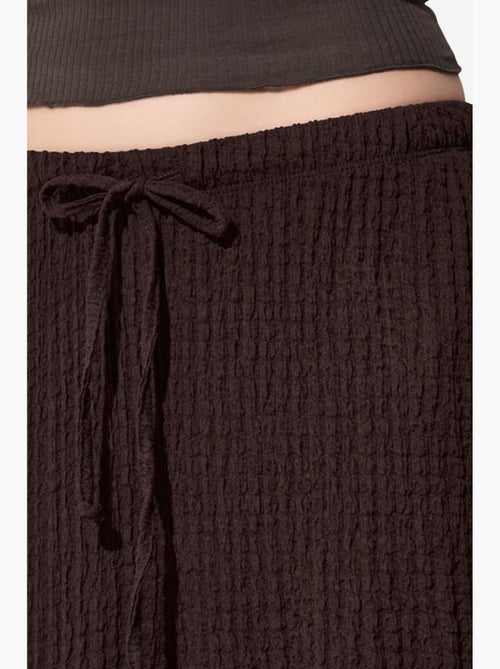 Pantalon jogger femme en tissu tissé busem - Kiabi Pantalon jogger femme en tissu tissé busem - Kiabi