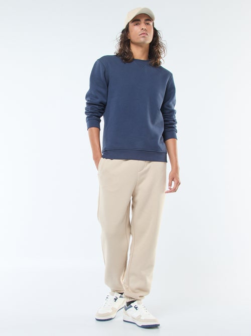 Pantalon jogging uni avec cordons de serrage à la taille - Kiabi