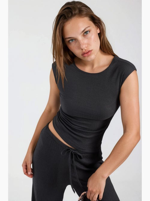 Pantalon large à taille coulissée busem - Kiabi Pantalon large à taille coulissée busem - Kiabi