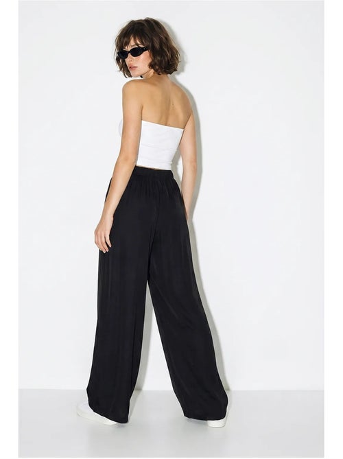 Pantalon large à taille élastique lucci - Kiabi Pantalon large à taille élastique lucci - Kiabi
