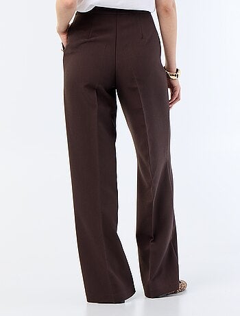 Pantalon large avec boutons dorés fantaisies sur les poches