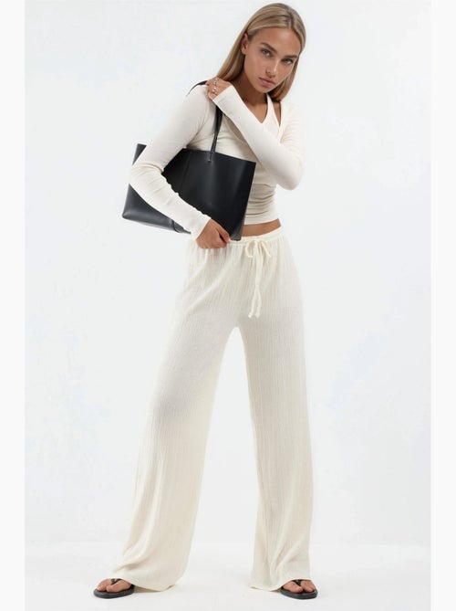 Pantalon large avec cordon de serrage à la taille busem - Kiabi Pantalon large avec cordon de serrage à la taille busem - Kiabi