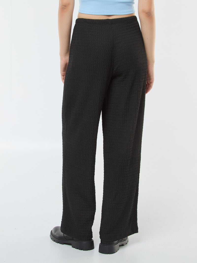 Pantalon large en maille crêpe Noir - Kiabi