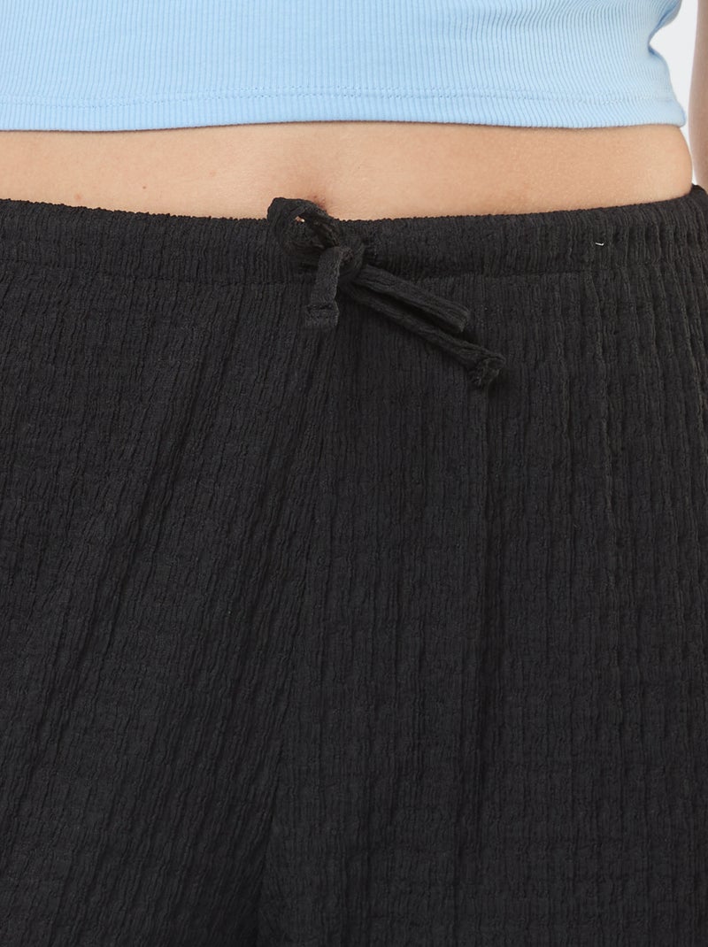 Pantalon large en maille crêpe Noir - Kiabi