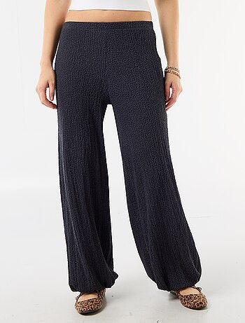 Pantalon large en maille crinkle femme