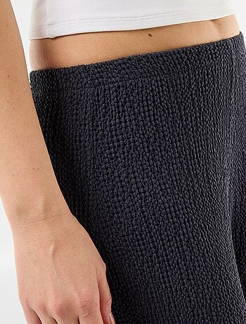 Pantalon large en maille crinkle femme