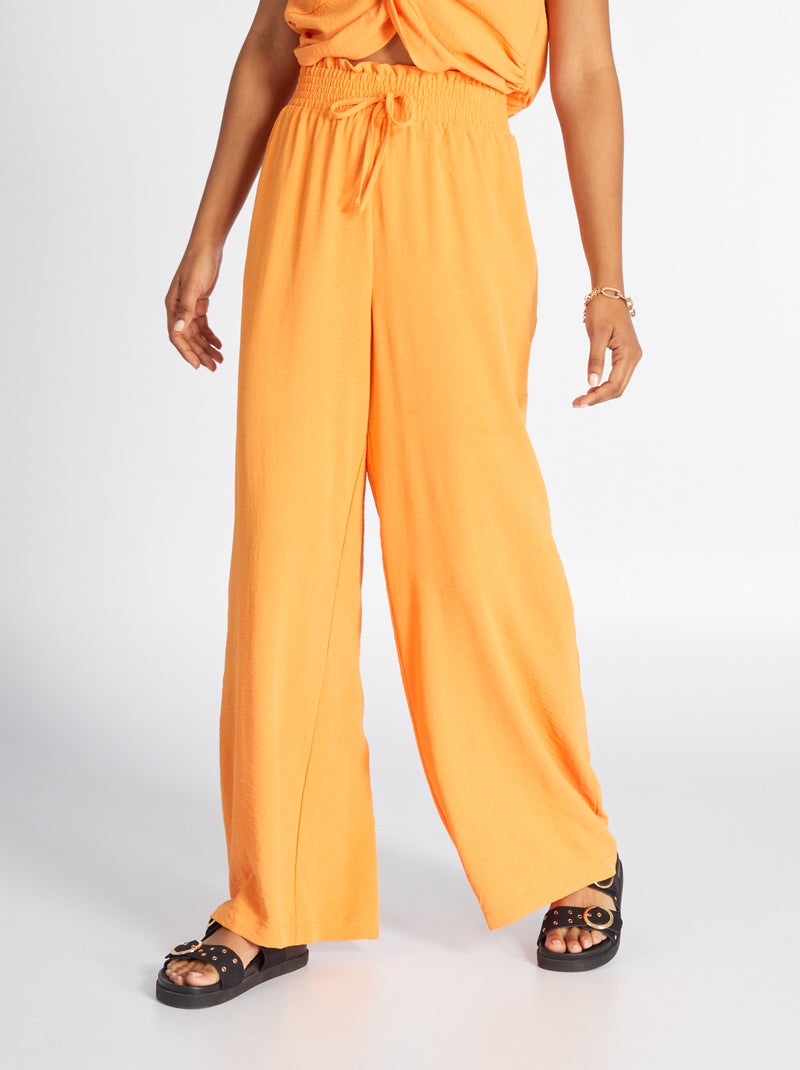 Pantalon large en maille satinée orange - Kiabi