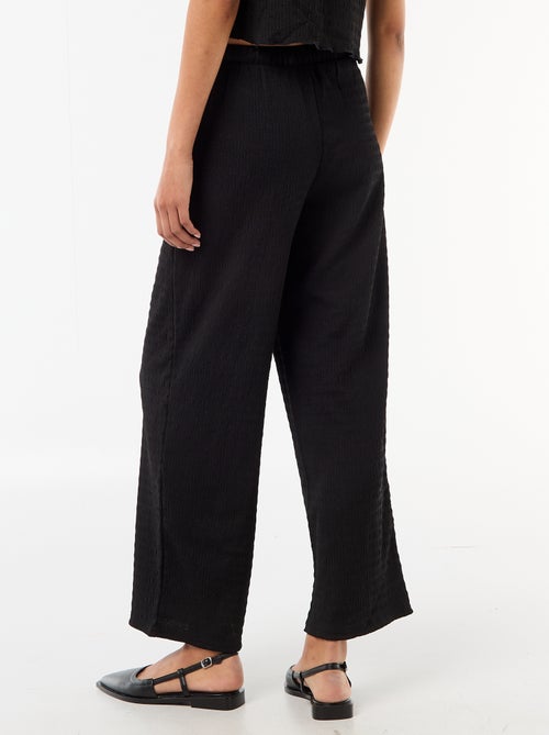 Pantalon large en maille smockée - Kiabi
