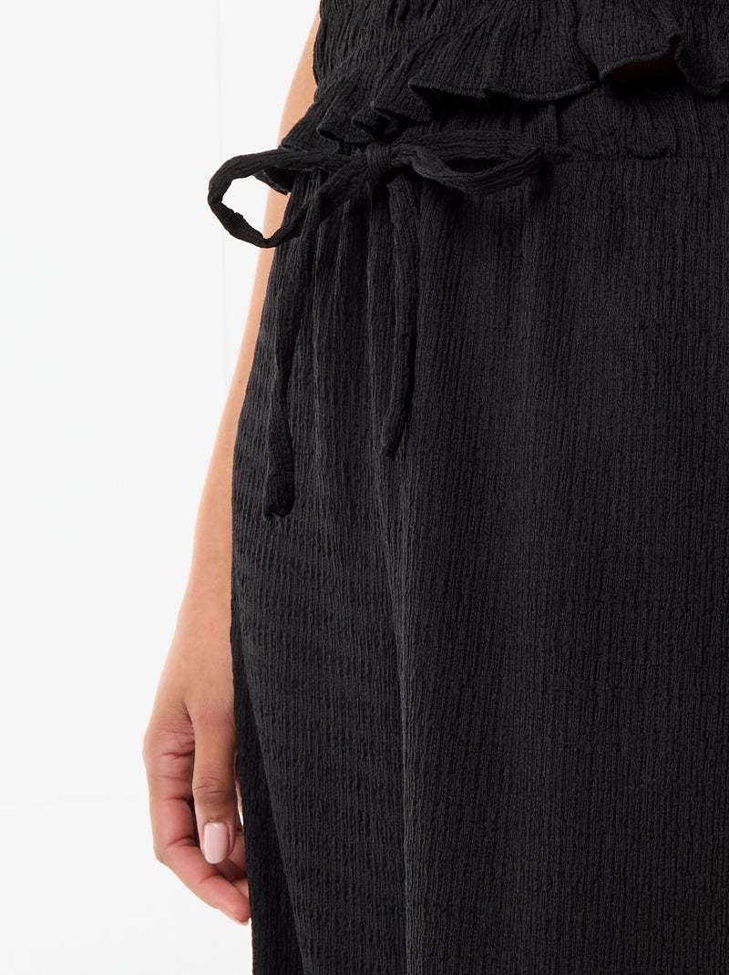 Pantalon large en maille smockée Noir - Kiabi