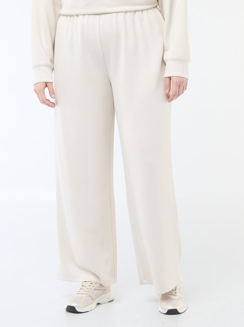Pantalon large en matière stretch côtelée - Kiabi