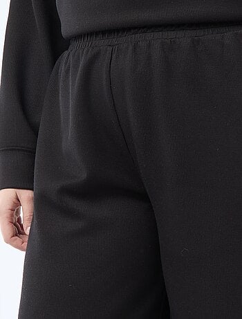 Pantalon large en matière stretch côtelée