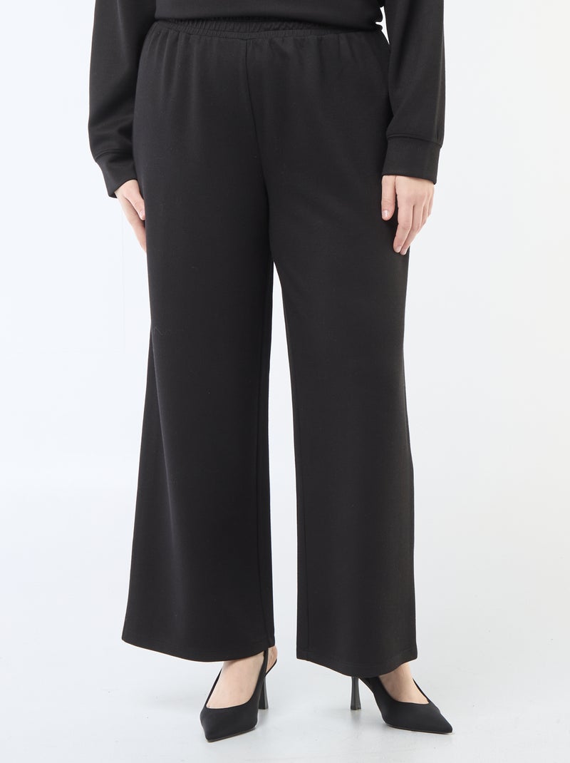 Pantalon large en matière stretch côtelée Noir - Kiabi