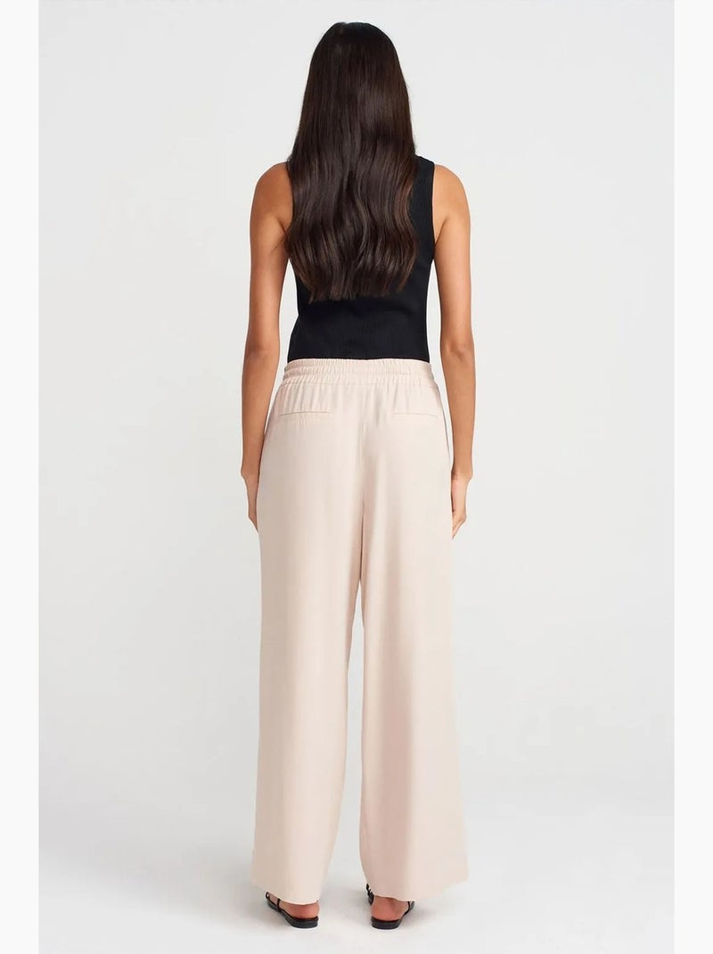 Pantalon large en tencel à taille coulissée dilvin Crème - Kiabi