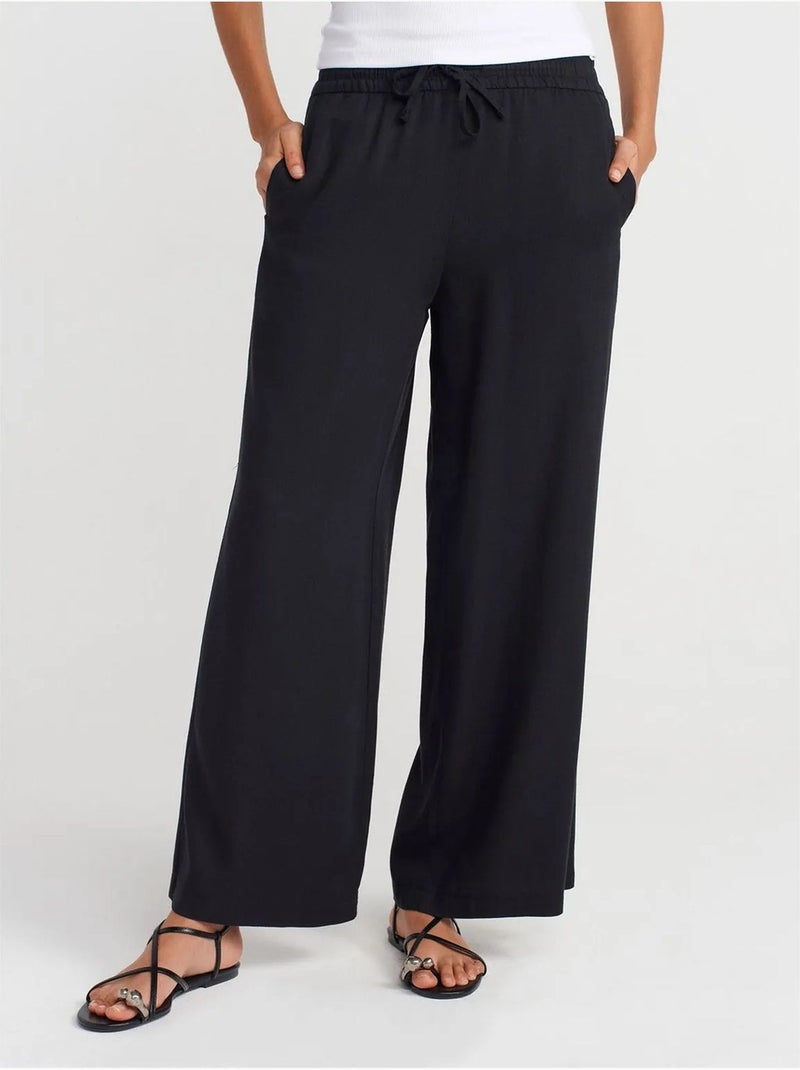 Pantalon large en tencel à taille coulissée dilvin Noir - Kiabi