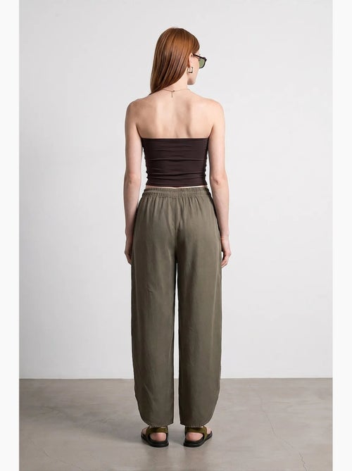 Pantalon large femme en tencel crêpe avec fente dilvin - Kiabi Pantalon large femme en tencel crêpe avec fente dilvin - Kiabi