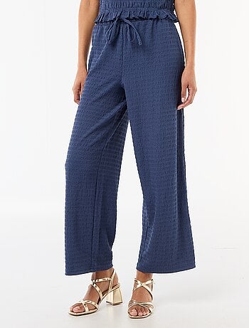 Pantalon large ne maille smockée