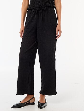 Pantalon large ne maille smockée