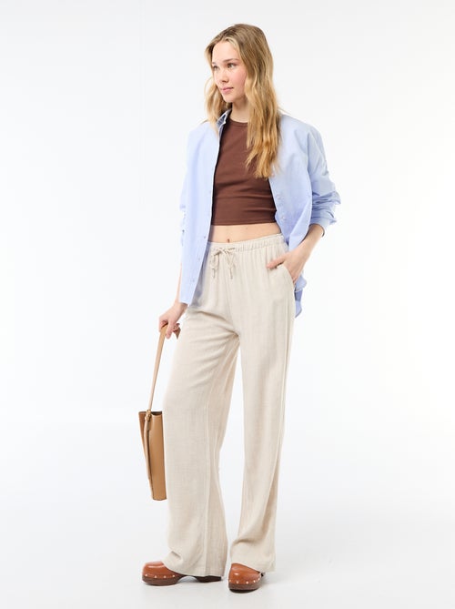 Pantalon large pour femme à taille élastiquée - Kiabi Pantalon large pour femme à taille élastiquée - Kiabi