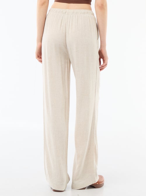 Pantalon large pour femme à taille élastiquée - Kiabi Pantalon large pour femme à taille élastiquée - Kiabi