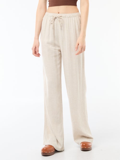 Pantalon large pour femme à taille élastiquée - Kiabi Pantalon large pour femme à taille élastiquée - Kiabi