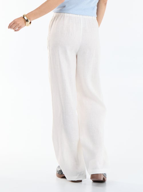 Pantalon large pour femme à taille élastiquée - Kiabi Pantalon large pour femme à taille élastiquée - Kiabi