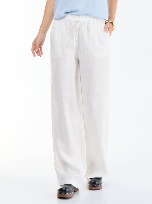 Pantalon large pour femme à taille élastiquée - Kiabi Pantalon large pour femme à taille élastiquée - Kiabi