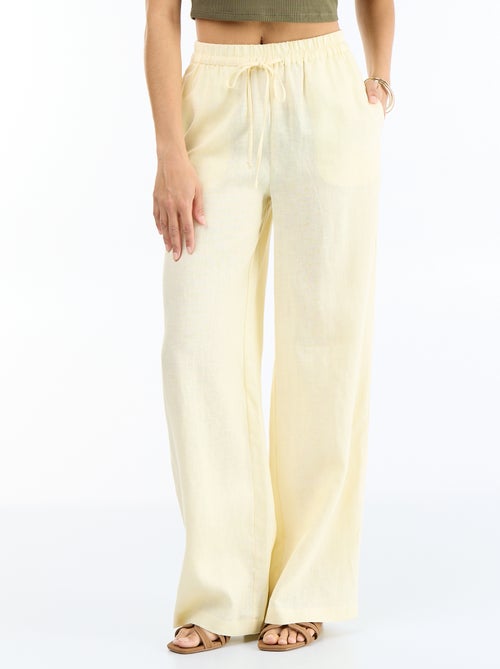 Pantalon large pour femme à taille élastiquée - Kiabi Pantalon large pour femme à taille élastiquée - Kiabi
