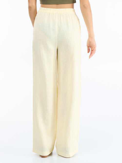 Pantalon large pour femme à taille élastiquée - Kiabi Pantalon large pour femme à taille élastiquée - Kiabi