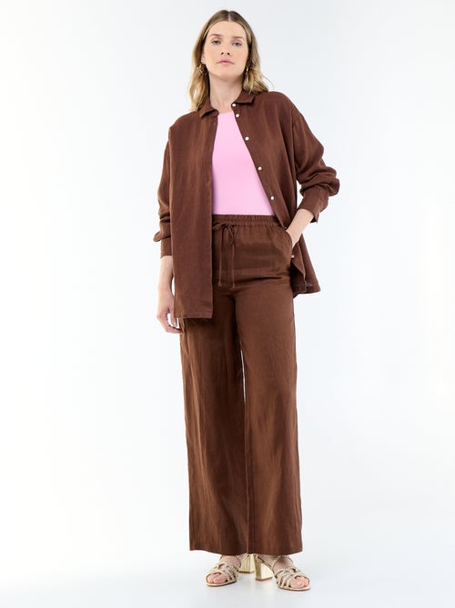 Pantalon large pour femme à taille élastiquée - Kiabi Pantalon large pour femme à taille élastiquée - Kiabi