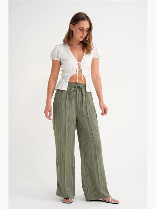 Pantalon large texturé taille haute avec fermeture à cordon mixray - Kiabi Pantalon large texturé taille haute avec fermeture à cordon mixray - Kiabi