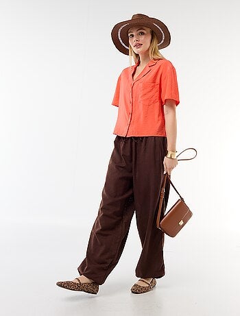 Pantalon large uni ceinture élastiquée