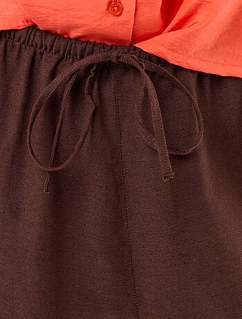 Pantalon large uni ceinture élastiquée