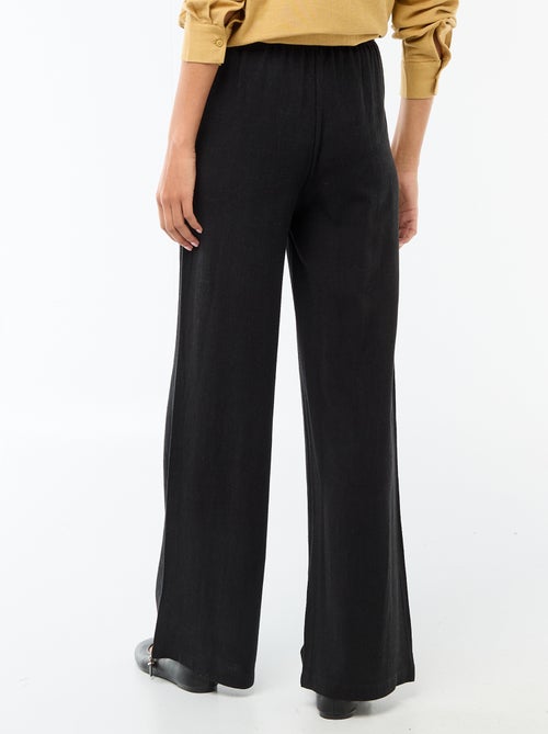 Pantalon léger femme à coupe large avec taille élastiquée - Kiabi Pantalon léger femme à coupe large avec taille élastiquée - Kiabi