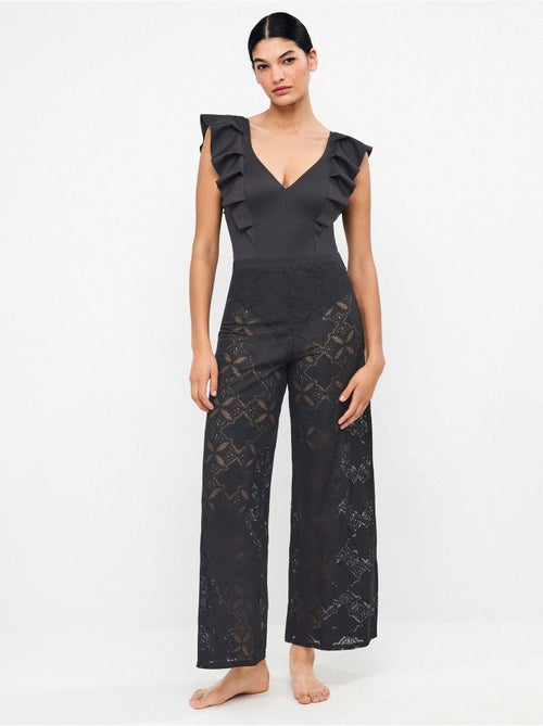 Pantalon long avec transparences édition beach party - Kiabi Pantalon long avec transparences édition beach party - Kiabi