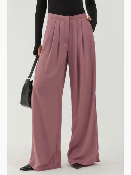 Pantalon palazzo à jambes larges et plissées hiccup - Kiabi Pantalon palazzo à jambes larges et plissées hiccup - Kiabi