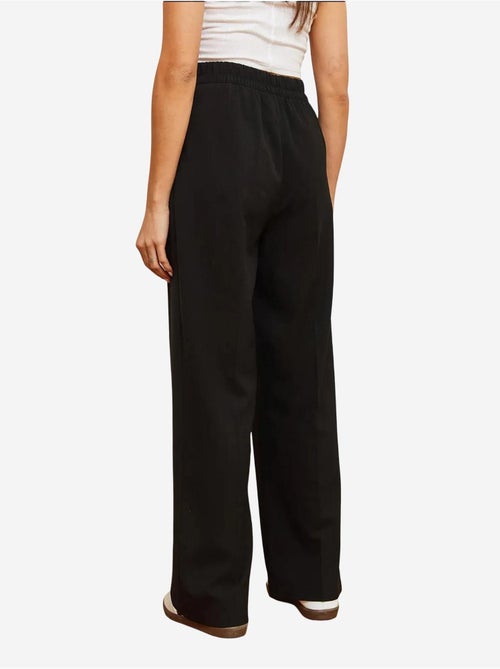 Pantalon palazzo boutonné à taille asymétrique et jambe large lucci - Kiabi Pantalon palazzo boutonné à taille asymétrique et jambe large lucci - Kiabi